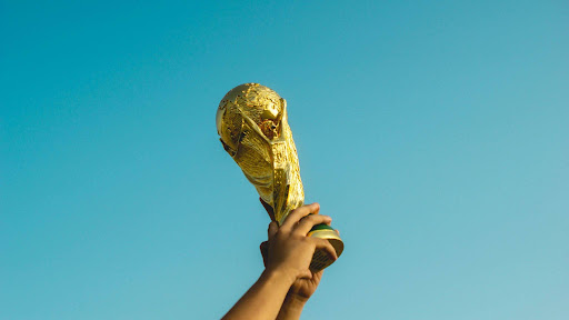 https://unsplash.com/photos/person-holding-gold-trophy-AmhdN68wjPc